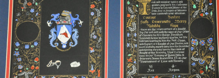 Side-by-side award scroll with illuminated heraldry on left and scroll text on the right